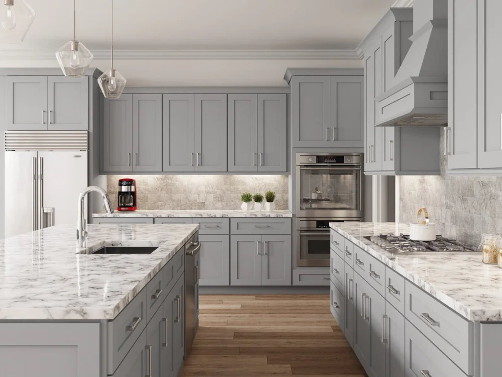 Galley kitchen in grey shaker cabinetry with white countertops